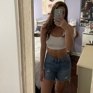 LEVI 501 MID THIGH SHORT